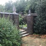 A gate bedecked in foliage
