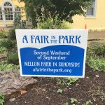 A sign that reads "A FAIR in the PARK Second Weekend of September Mellon Park in Shadyside"